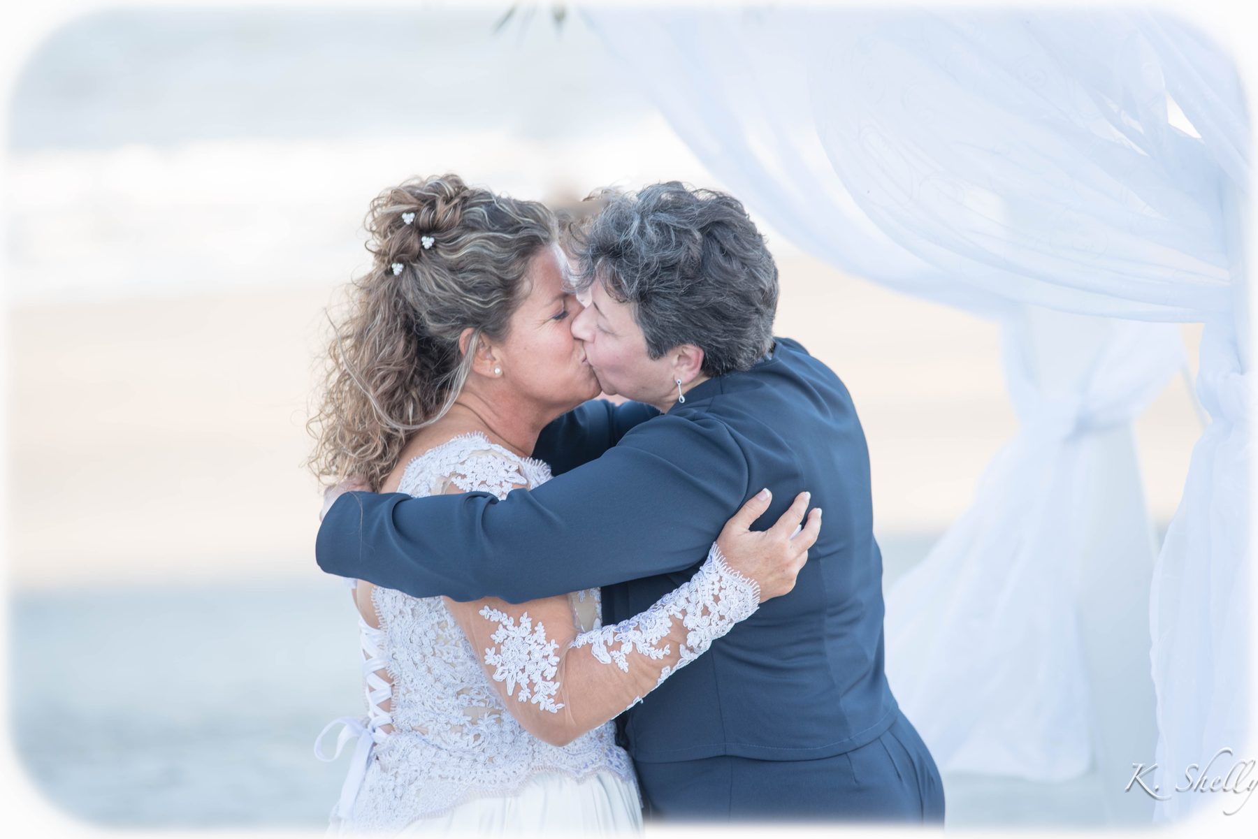 Asheville wedding photographer – destination beach wedding first kiss