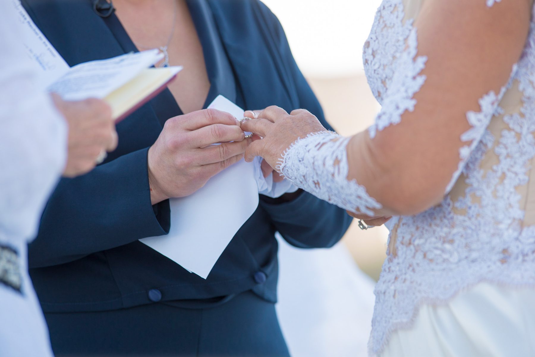 Best Asheville wedding photographer – wedding ring detail beach ceremony
